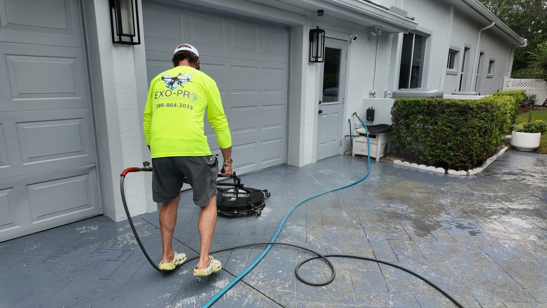 Exo-Pro cleaning a residential driveway